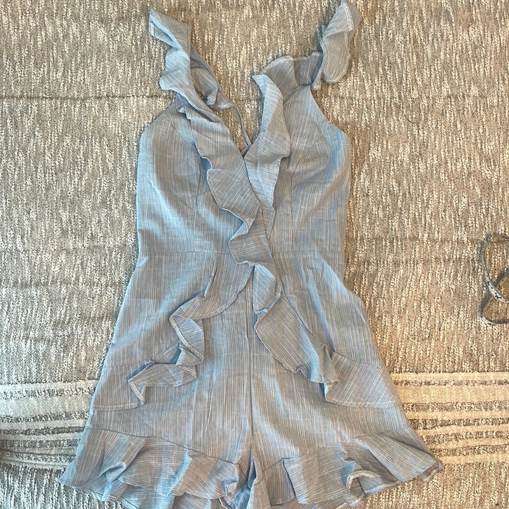 Ruffled baby blue romper size M